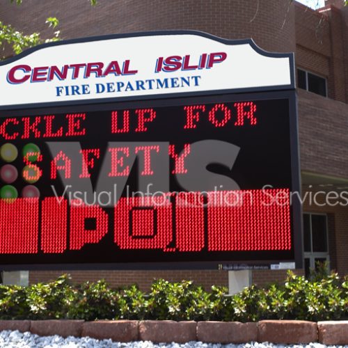 Fire department sign: "Buckle Up for Safety.