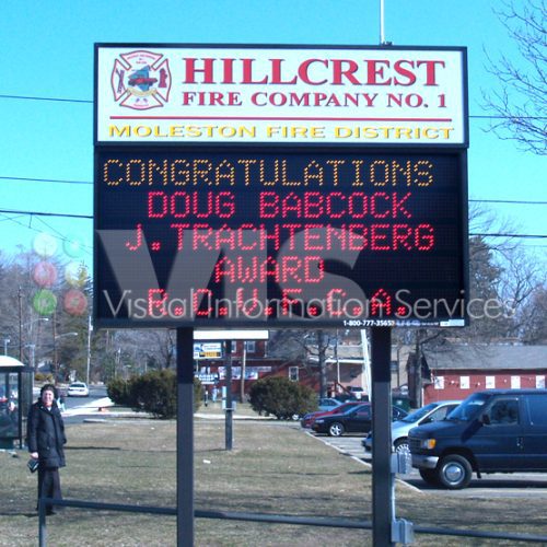 Fire department sign congratulating award recipients.