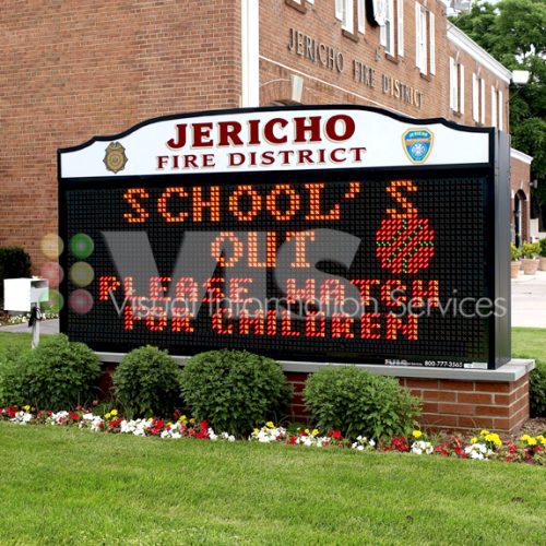 Fire district sign with safety message.