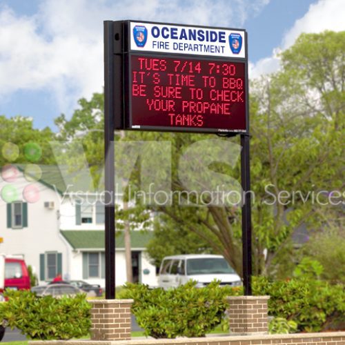 Fire department sign with BBQ safety message.