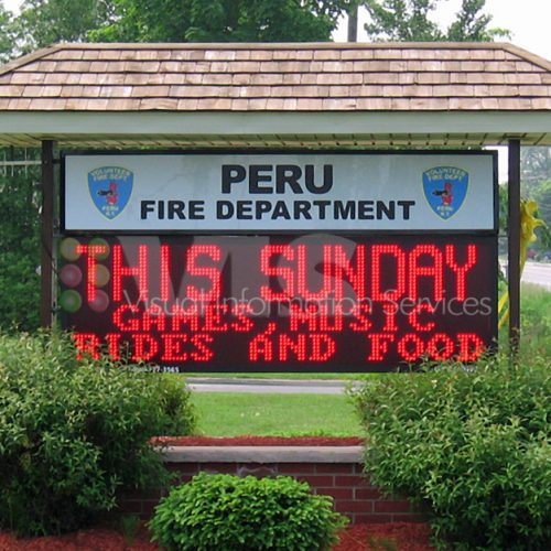 Fire department sign with event details.