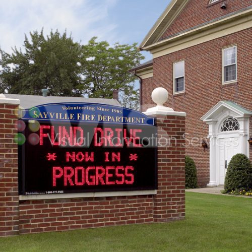 Fire department fund drive sign in progress.