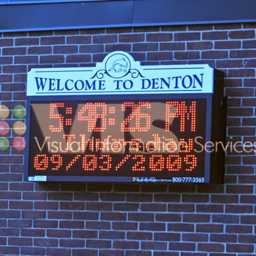 Welcome to Denton sign with digital clock.