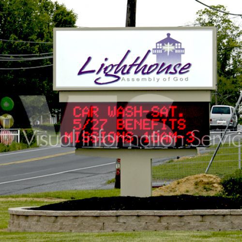 Church sign announcing car wash event.