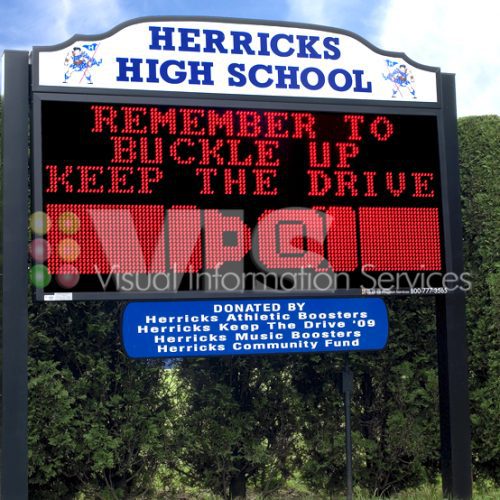Herricks High School sign with safety message.
