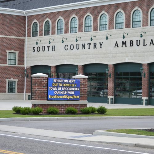 South Country Ambulance building with COVID-19 sign.