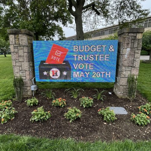 Sign for budget and trustee vote, May 20th.